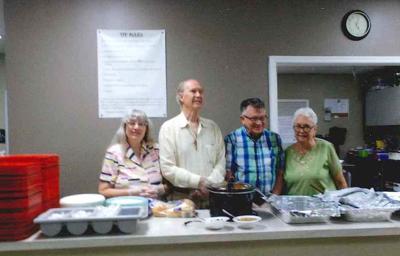 Cecil Dem Club serves dinner to homeless