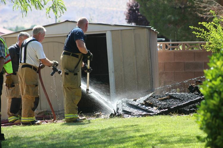 Firefighters douse shed fire threatening home | Local News ...