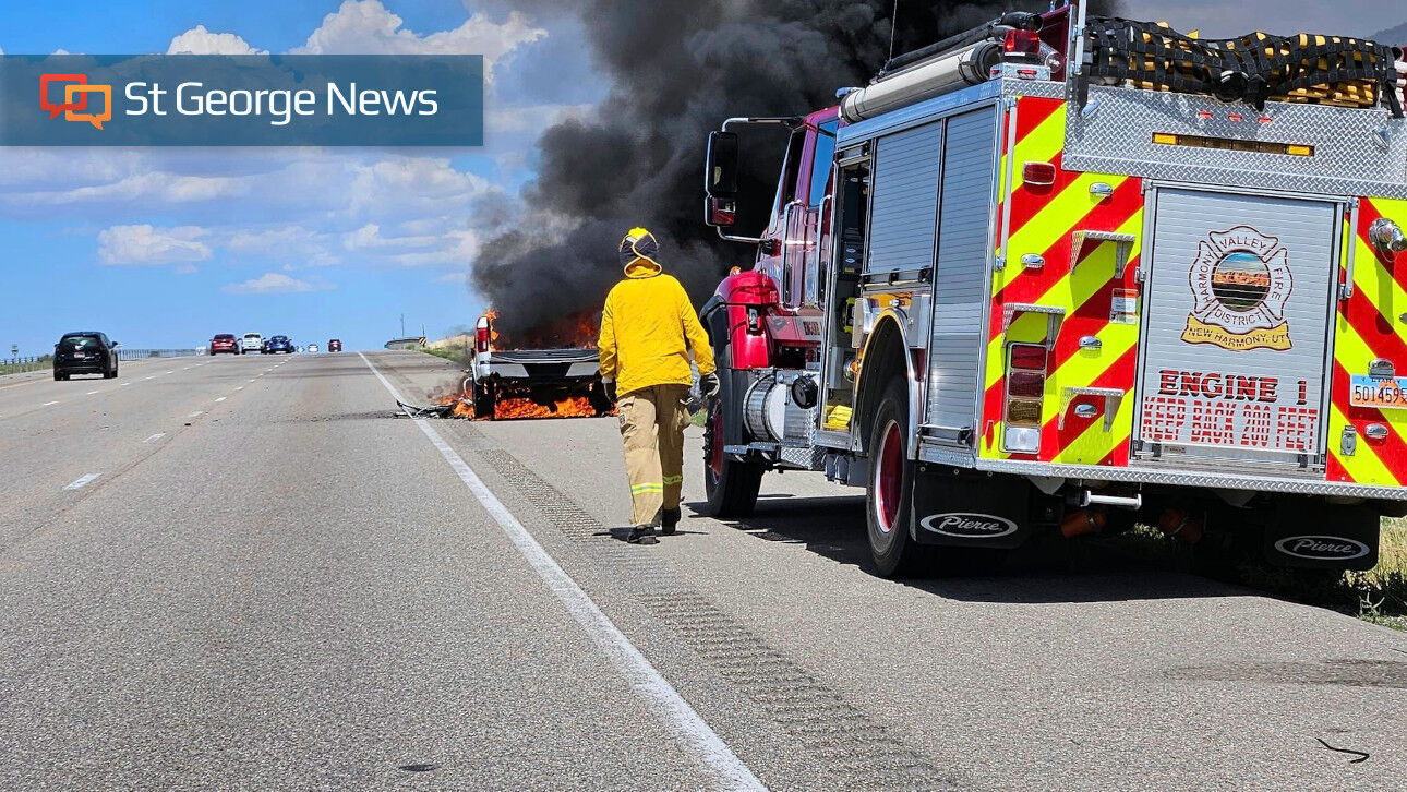 Vehicle fire temporarily closes one lane of I-15, spreads to brush near ...