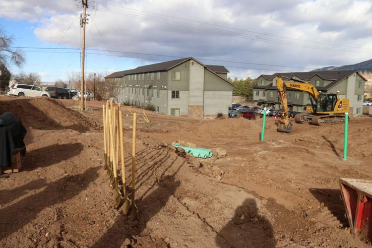Officials break ground on new 20-unit Coal Creek Townhomes development ...