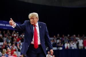 Trump Campaigns in Michigan Day After Obama Rally