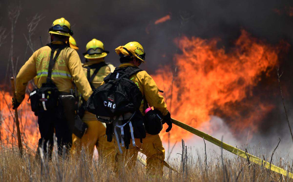 Brush fire burns 28 acres on Cucamonga Avenue south of the California Institution for Women in Chino