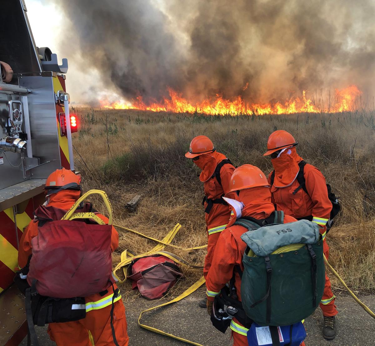 Brush fire burns 28 acres on Cucamonga Avenue south of the California Institution for Women in Chino