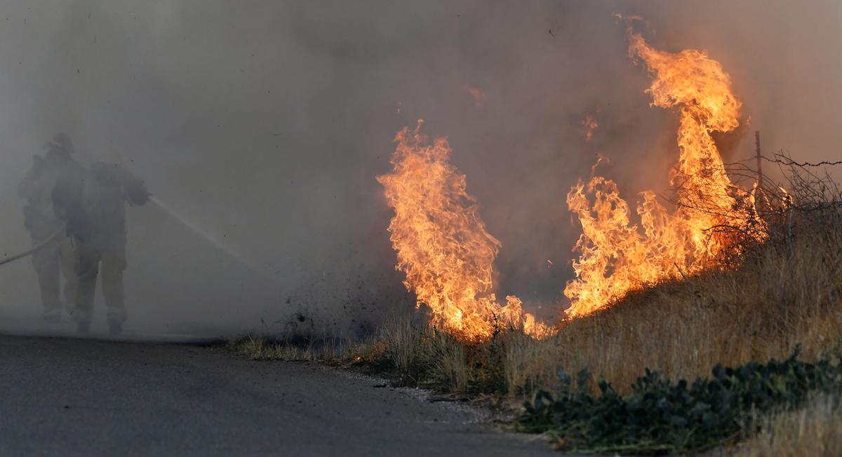 Brush fire burns 28 acres on Cucamonga Avenue south of the California Institution for Women in Chino