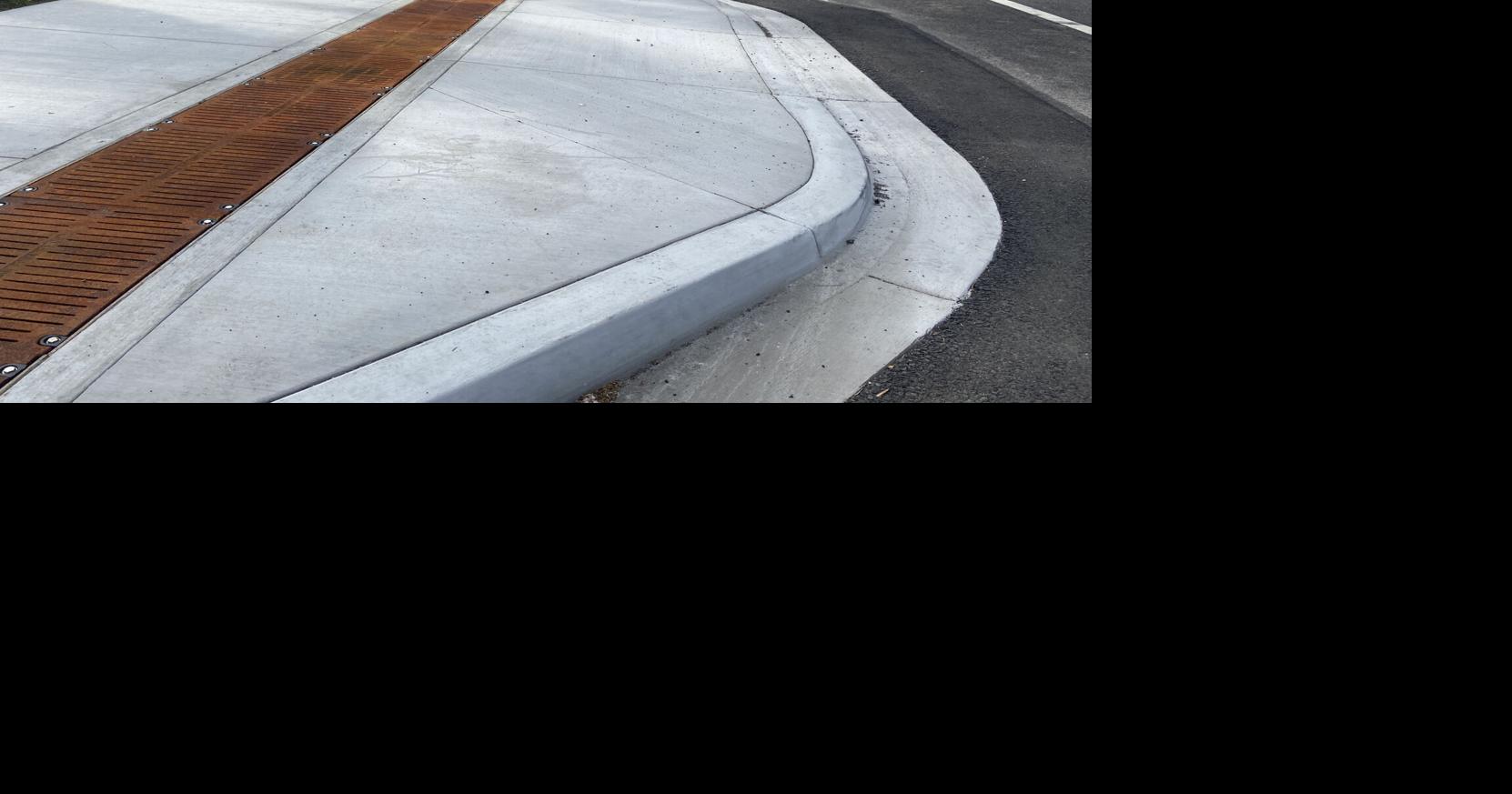 Residents question curb ramp placement News