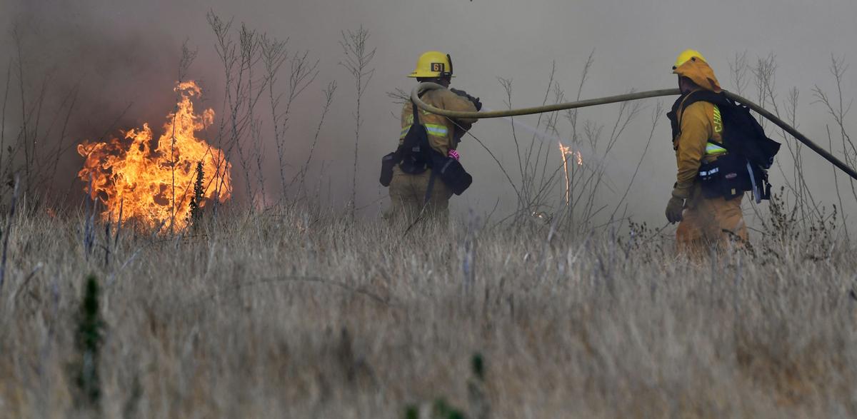 Brush fire burns 28 acres on Cucamonga Avenue south of the California Institution for Women in Chino
