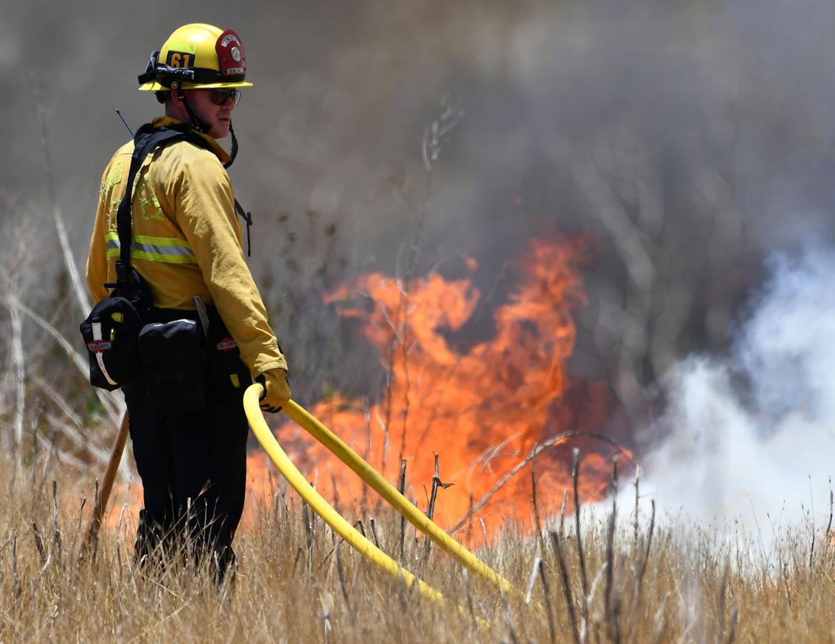 Brush fire burns 28 acres on Cucamonga Avenue south of the California Institution for Women in Chino