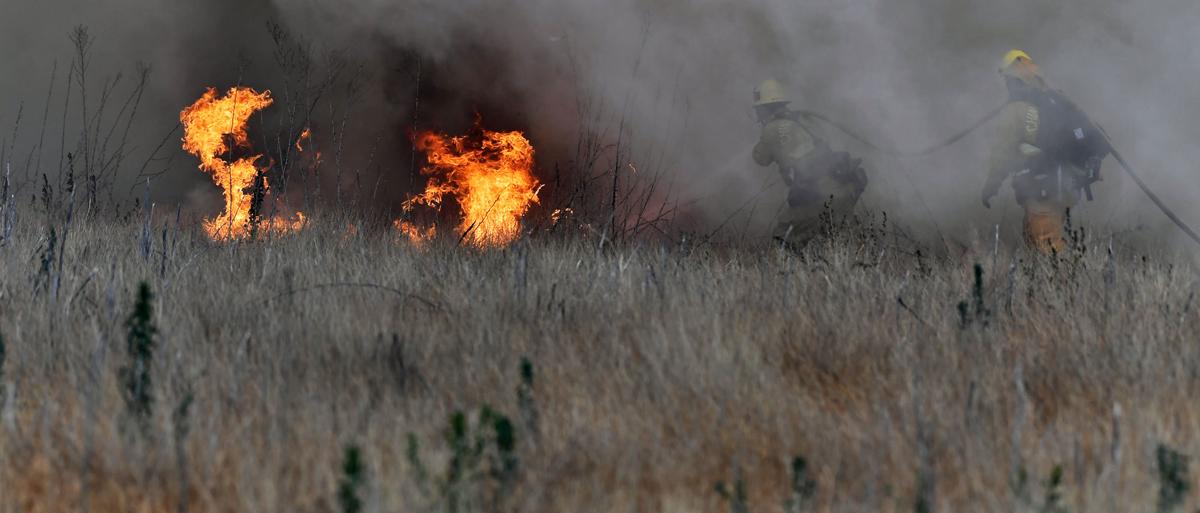 Brush fire burns 28 acres on Cucamonga Avenue south of the California Institution for Women in Chino