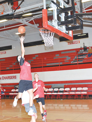 Jackson Curnutte goes in for lay up during scrimmage at Meet the Chargers