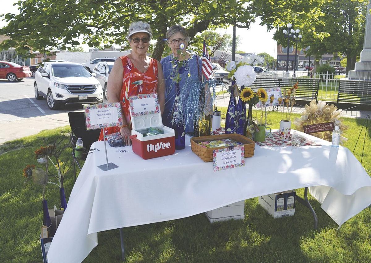 Linda Baynes and Cathy Marker with wine decor items.tif