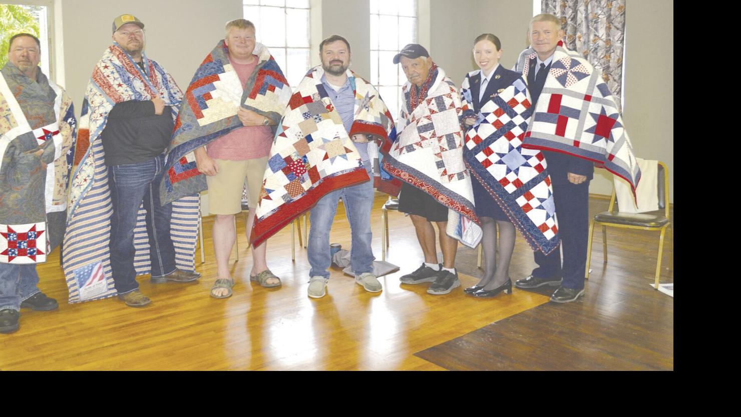Fourteen veterans presented with Quilts of Valor on 4th of July News