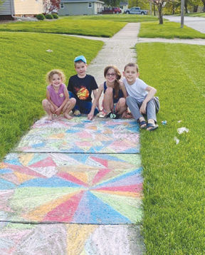 Dave and Lana Kuball's grandchildren spruce up their sidewalks