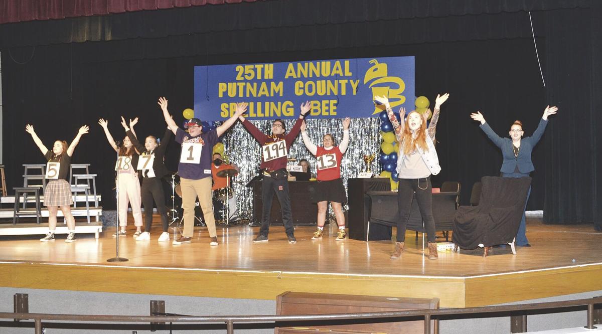 Fall musical characters with hands up in air during scene.tif