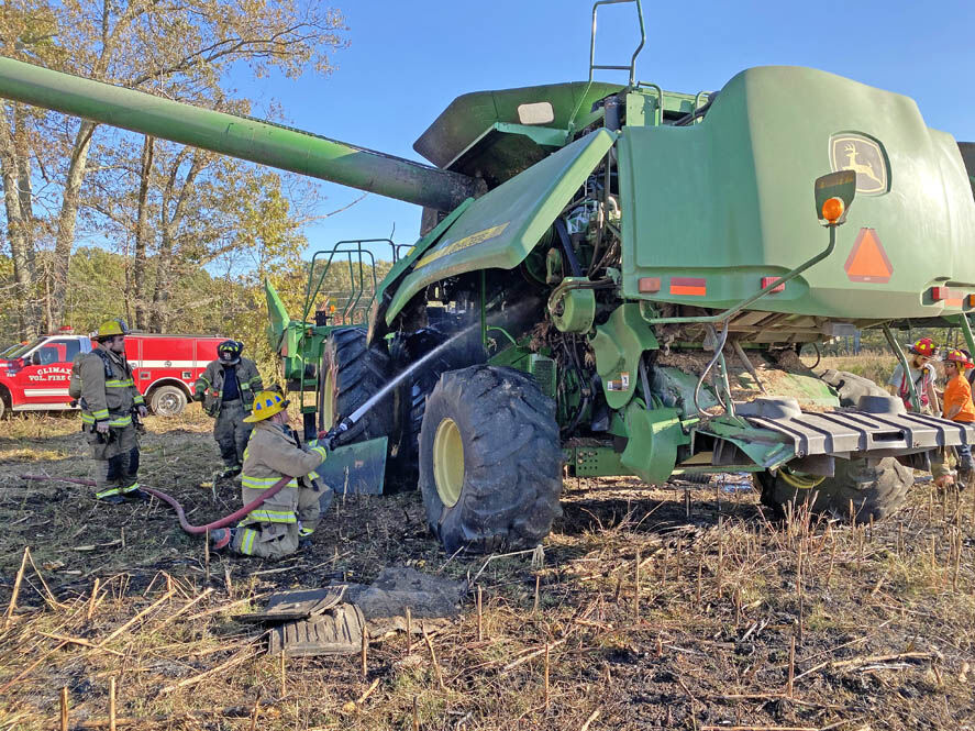 john deere combine on fire