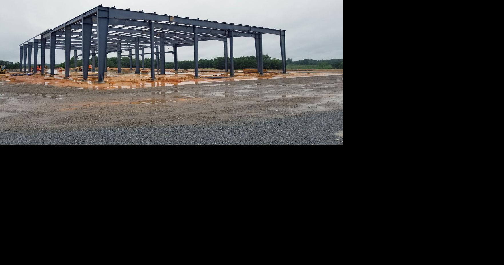 J&J Truck sales lifts first steel supports in Chatham News