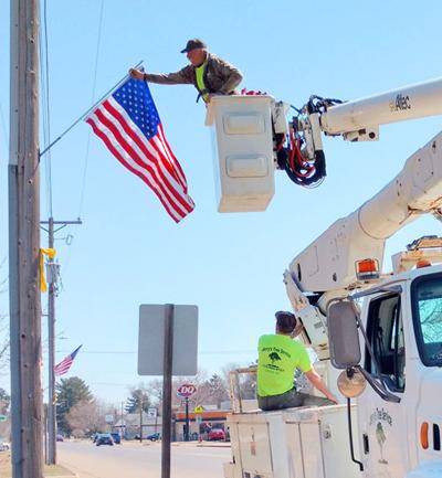 109 new flags line Dallas, Knapp, Second streets in Chetek | Top ...