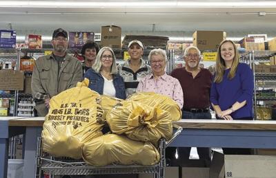 Barron Electric donates spuds to Chetek Food Shelf for holidays ...