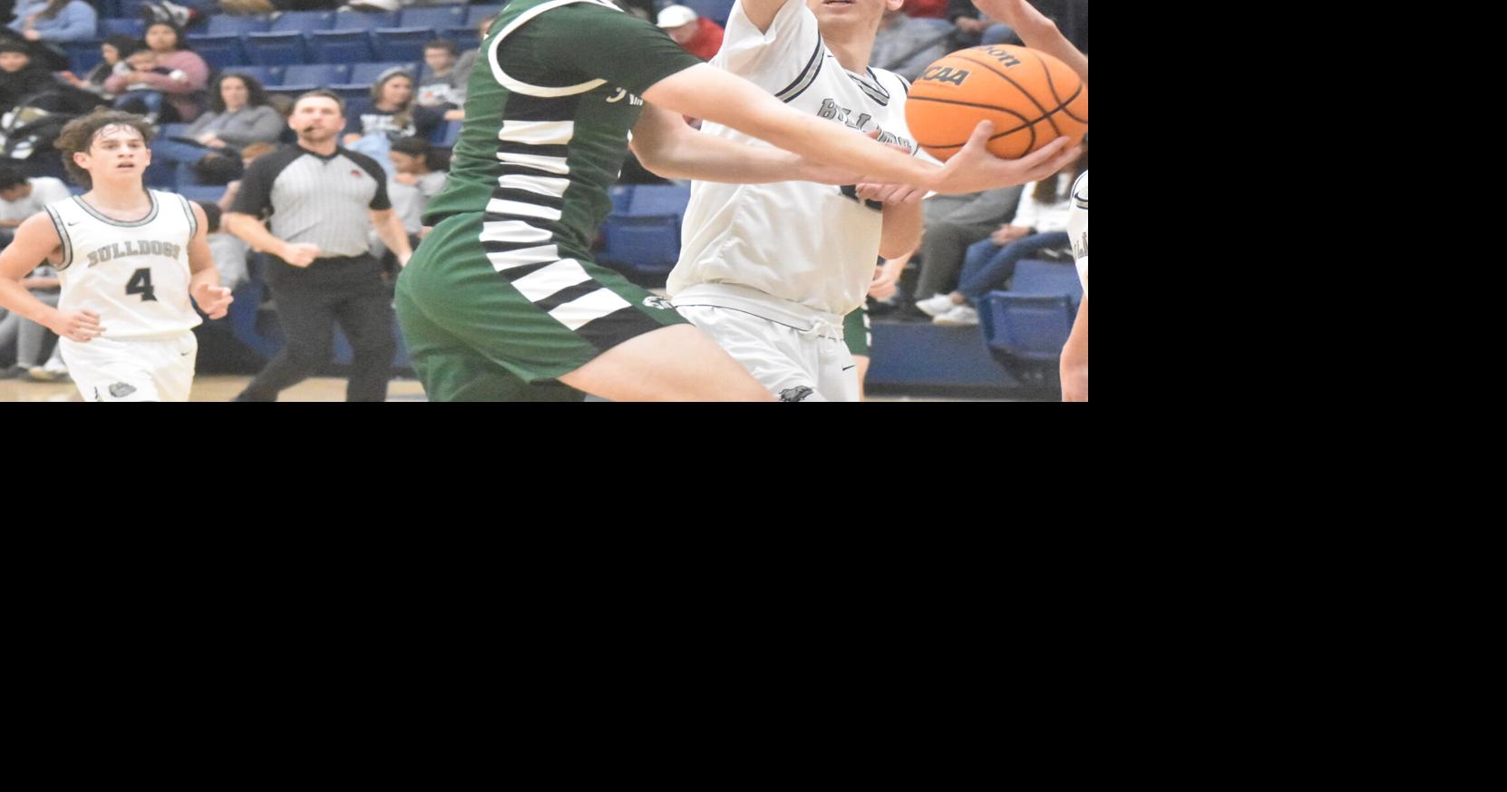 BASKETBALL AmPo boys take down Minco Sports