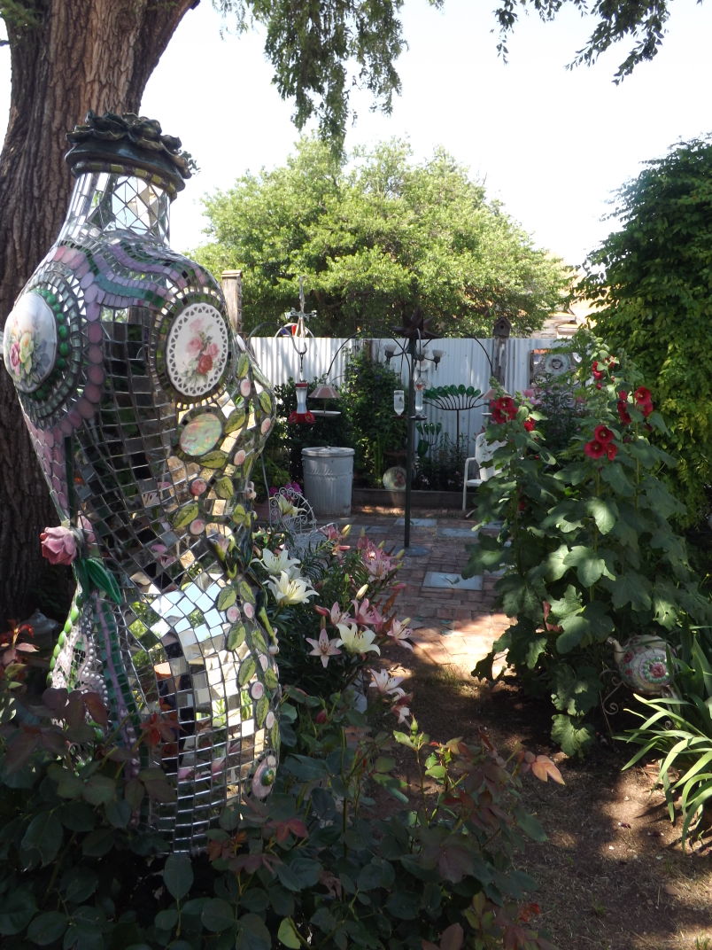 Mosaics and a mannequin: the garden of Becky Norris | News ...