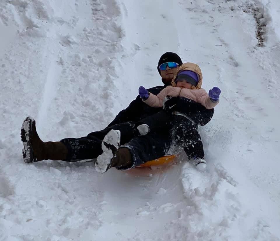 Sledding down a hill