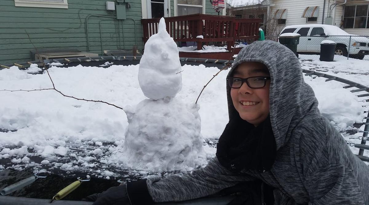 This trampoline snow man is hoppin'