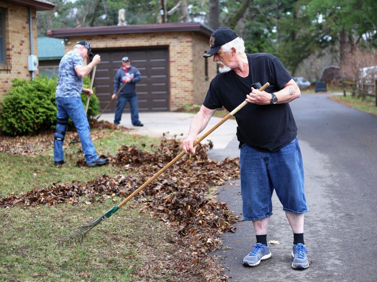 Vets tackle yard cleaning project for local fellow veteran ...
