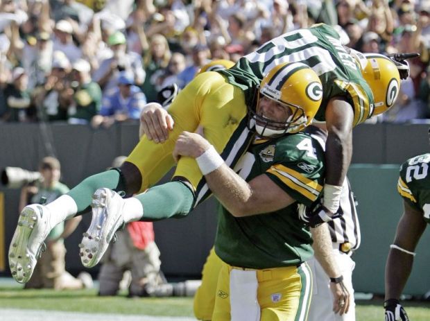 Green Bay Packers quarterback Brett Favre lifts Donald Driver after  throwing a touchdown pass to Greg Jennings during the second half of an NFL  football game against the San Diego Chargers Sunday