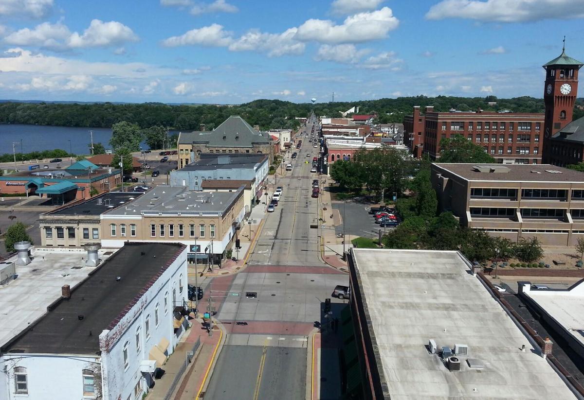 Downtown sidewalk sale encourages strolling and shopping