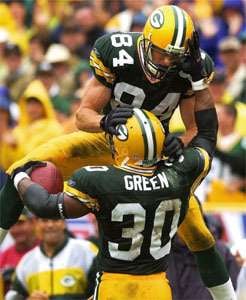 THE ASSOCIATED PRESS — Green Bay running back Ahman Green is congratulated  by receiver Bill Schroeder after