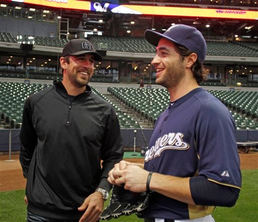 Aaron Rodgers throws out 1st pitch at Miller Park; players may gather soon