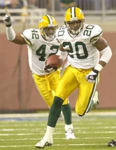 PAUL SANCYA / THE ASSOCIATED PRESS — Green Bay Packers safety Marques  Anderson (20) returns an interception 78