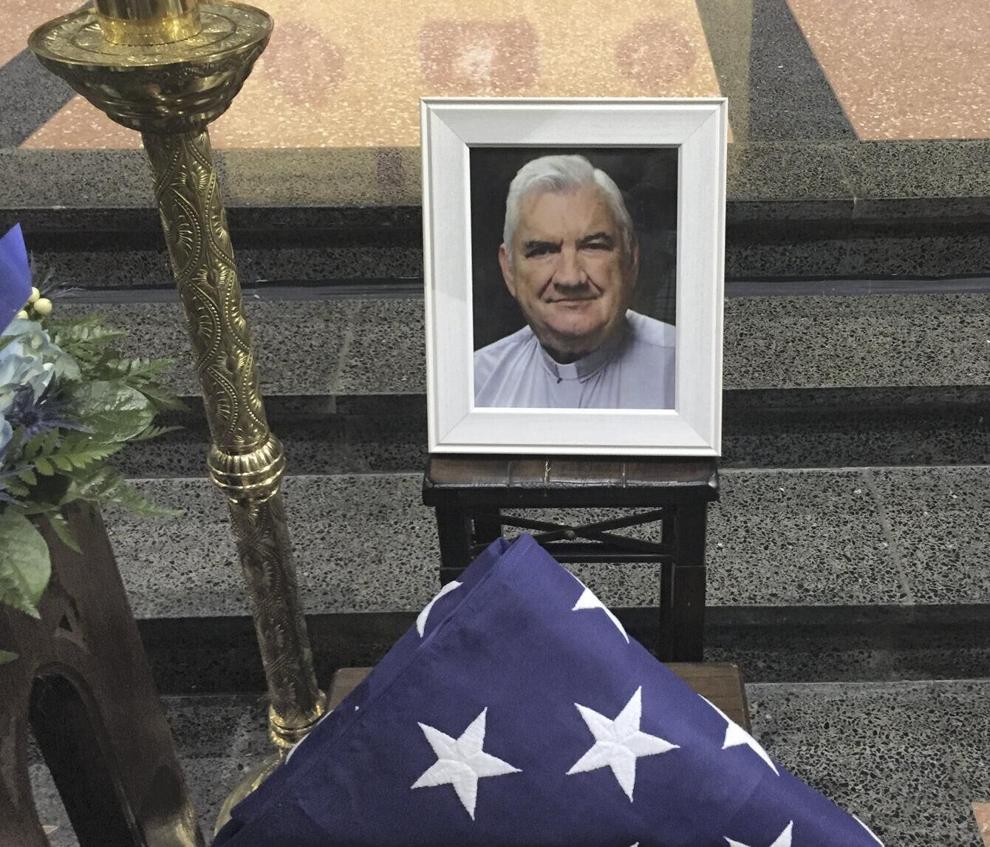 A pro surfer rescues a woman struggling in rough water on