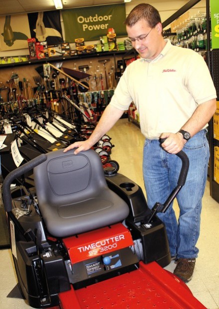 Rasmussen trades in corporate job for area hardware stores