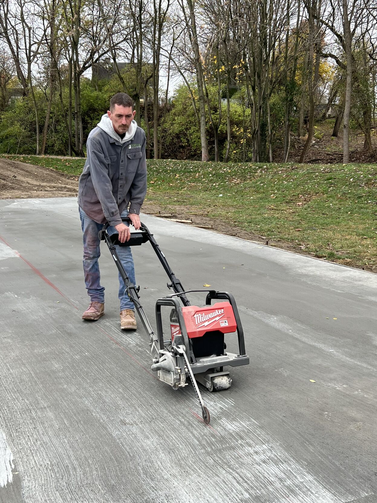 Concrete poured at Ted Lewis Park for basketball courts Community Concrete poured at Ted Lewis Park for basketball courts Community