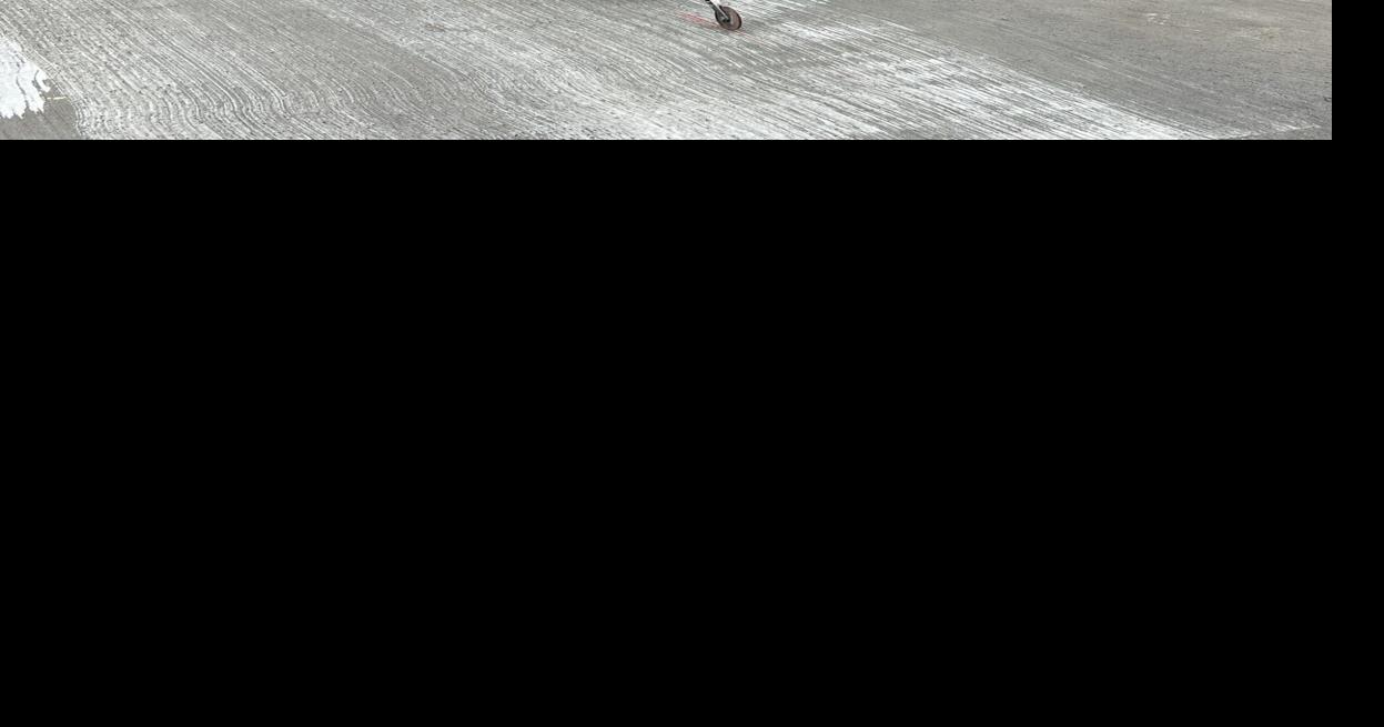 Concrete poured at Ted Lewis Park for basketball courts Community