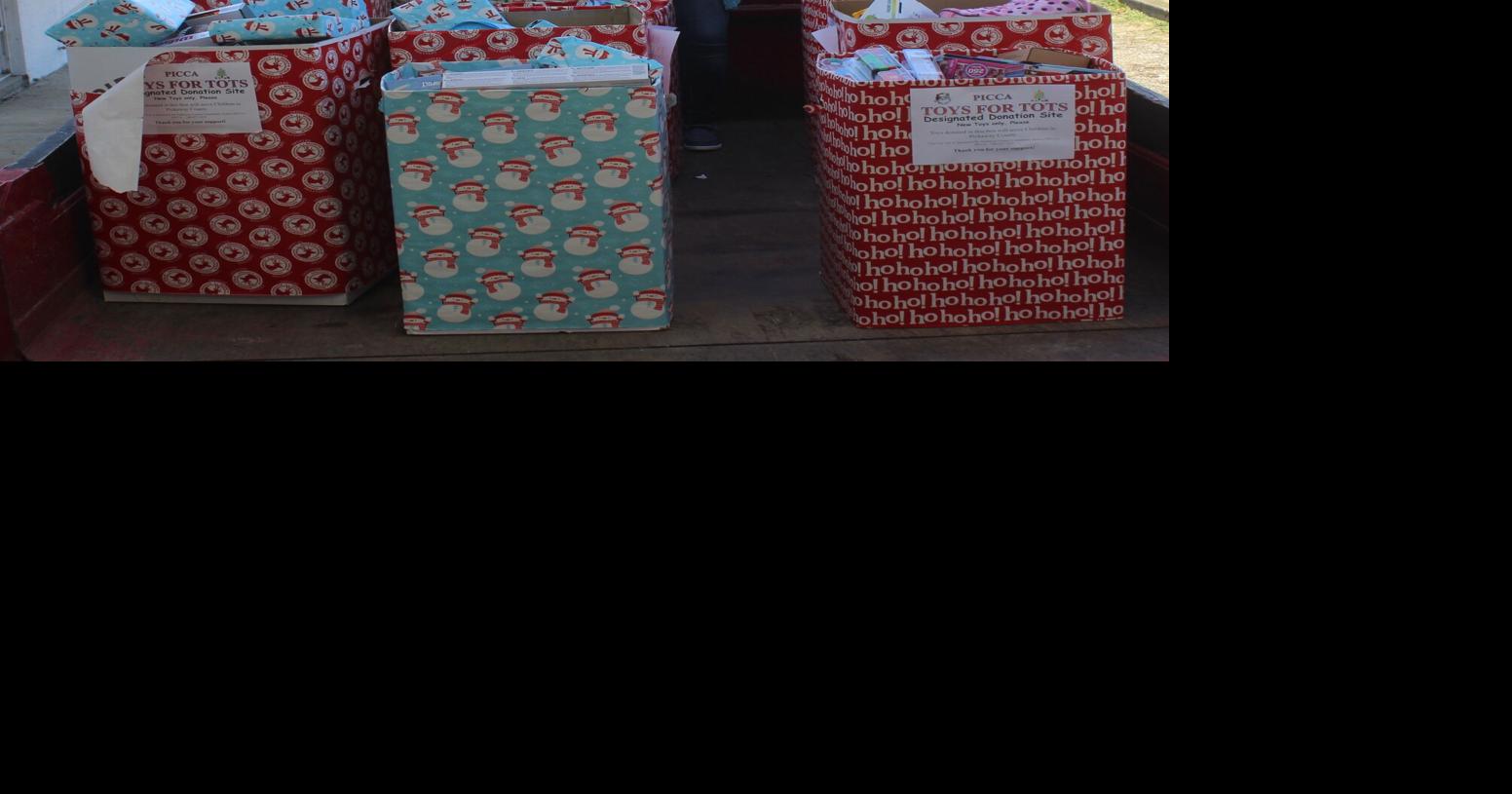 Santa's helpers: County employees donate toys | News ...