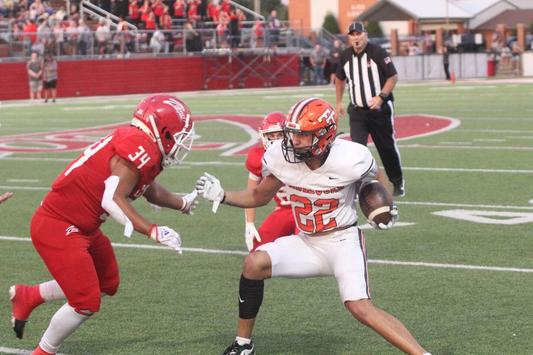Claremore Football Triumphs 2821 Over Tahlequah in District Opener