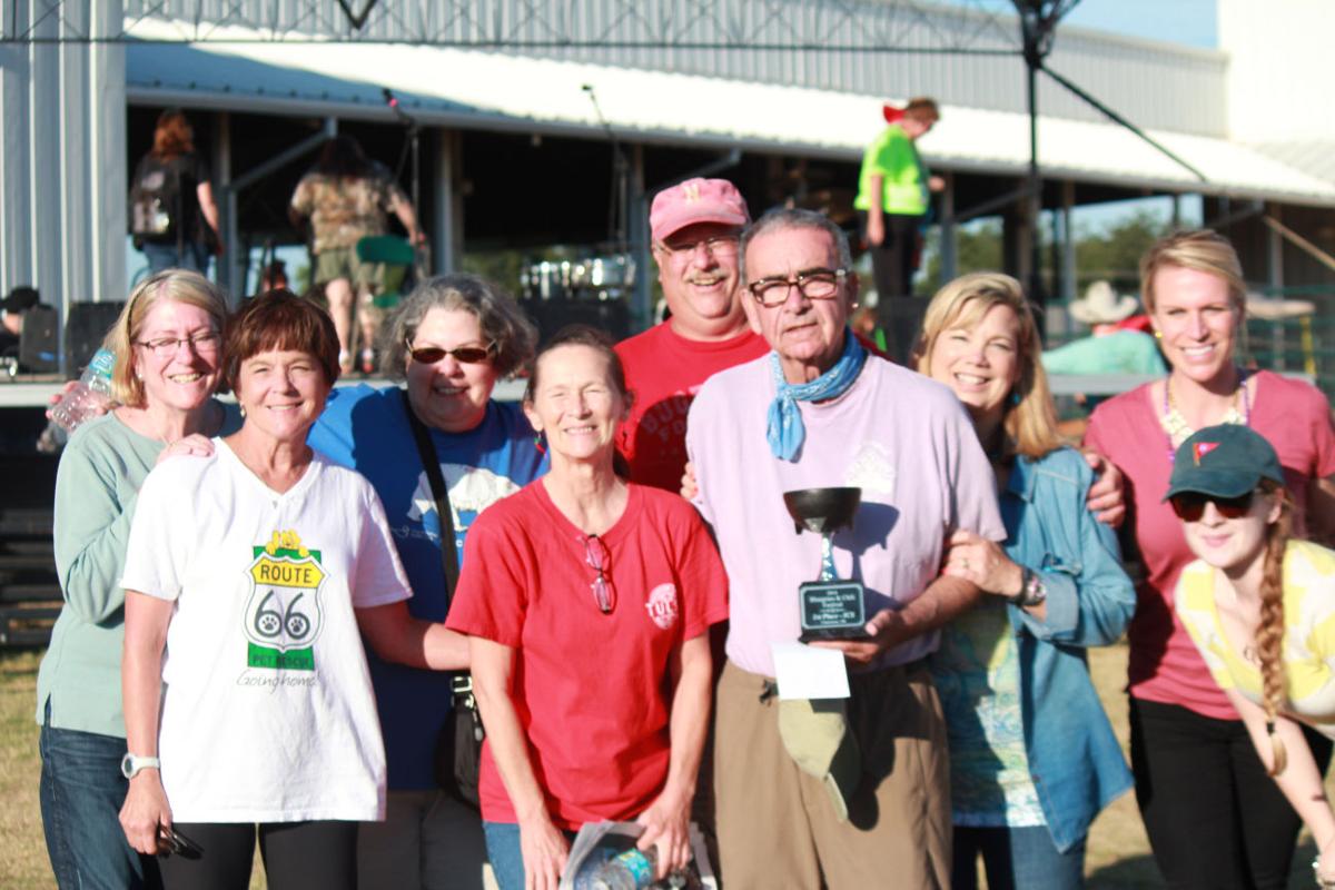 Tony Loretti and his team celebrate first place