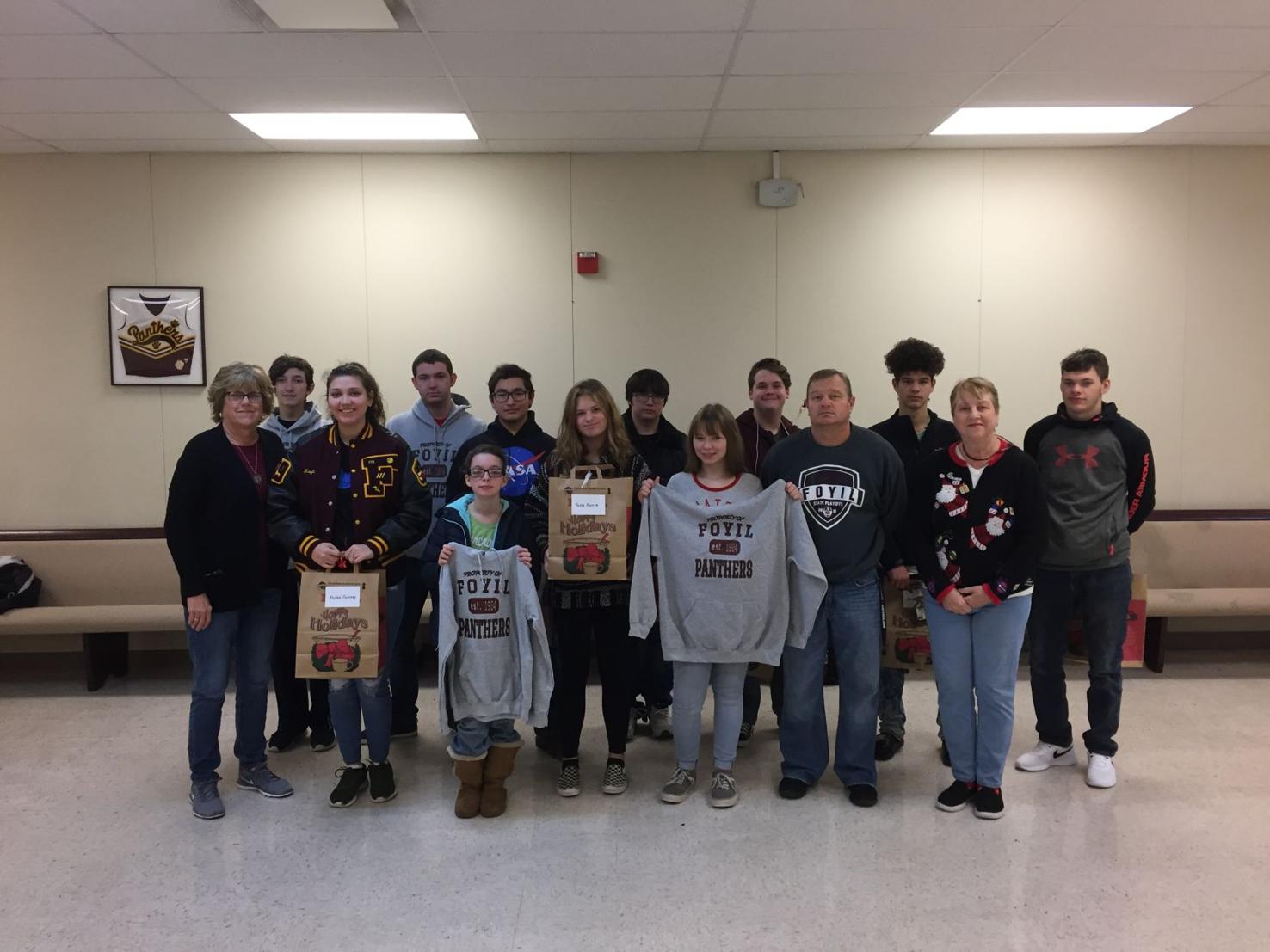 Foyil students receive a Totally Teen Christmas News