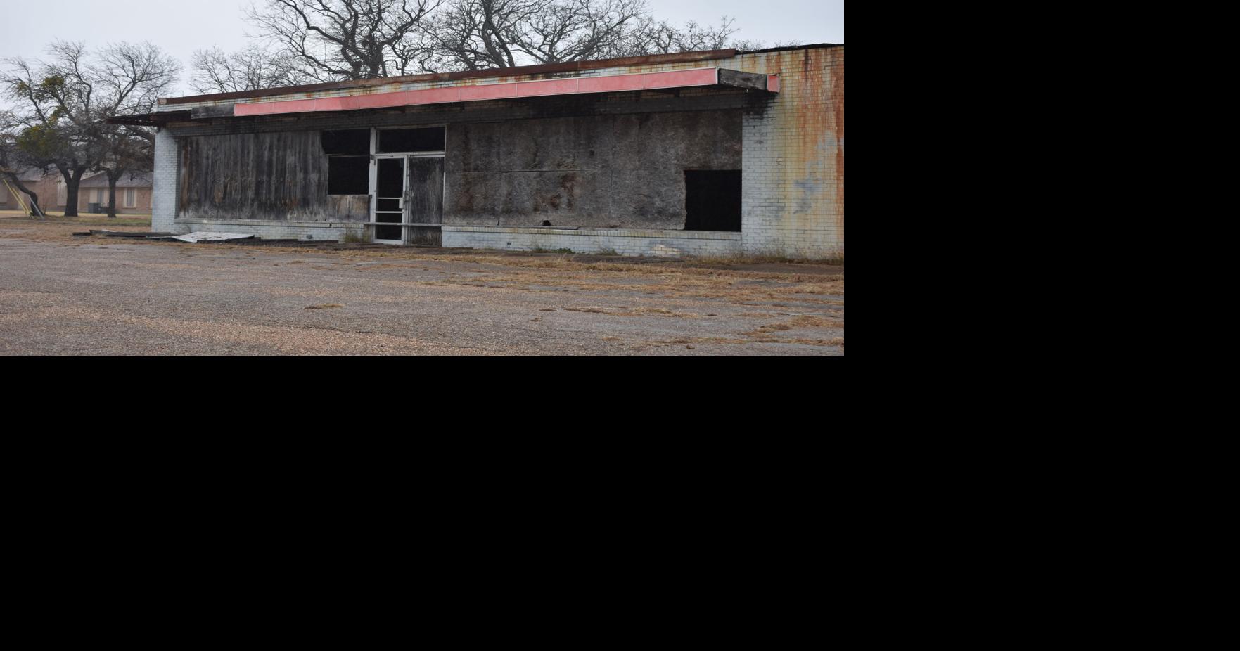 Vandalized East Side grocery store has grisly past Local News