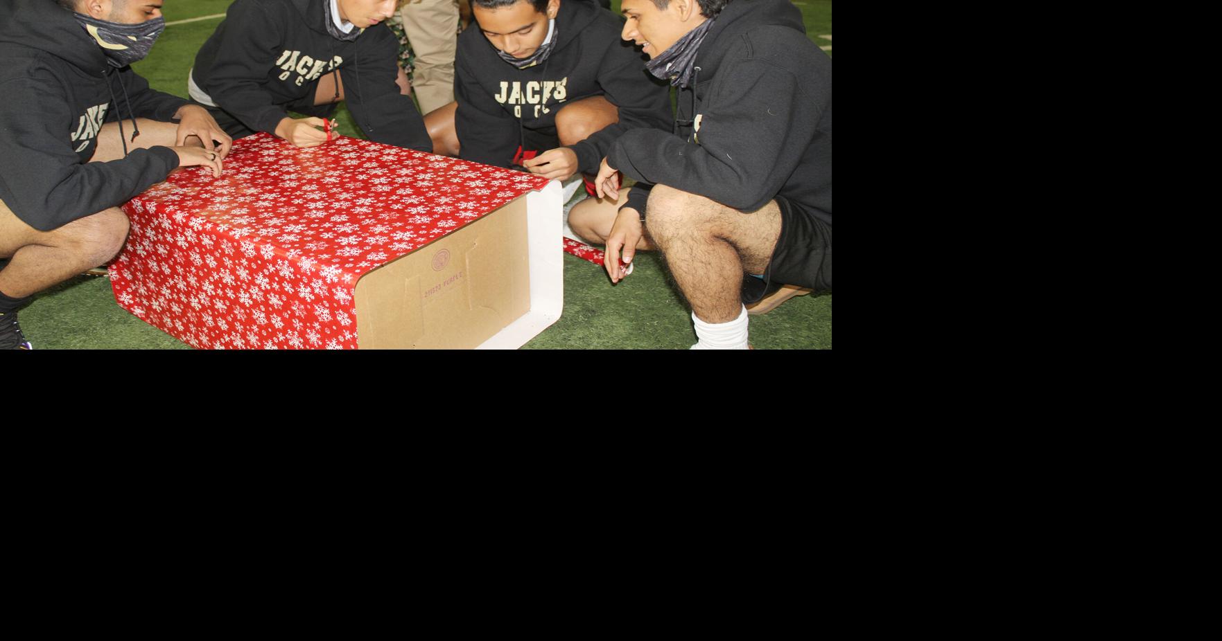 Soccer Santas Cleburne soccer holding toy drive Sports