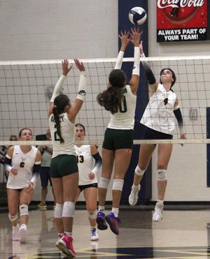 Lady Mustangs notch district win
