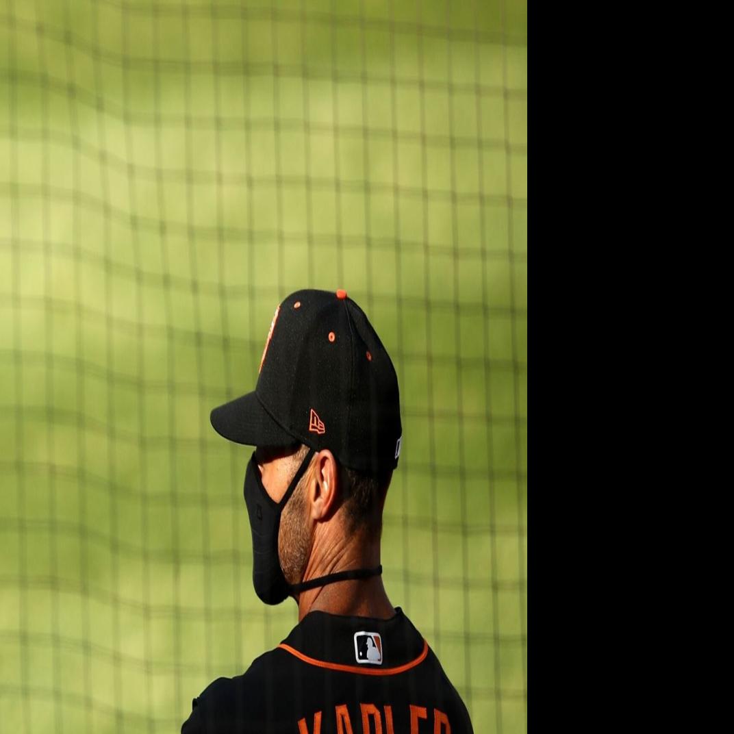 Giants Jewish manager Gabe Kapler kneels during playing of national anthem