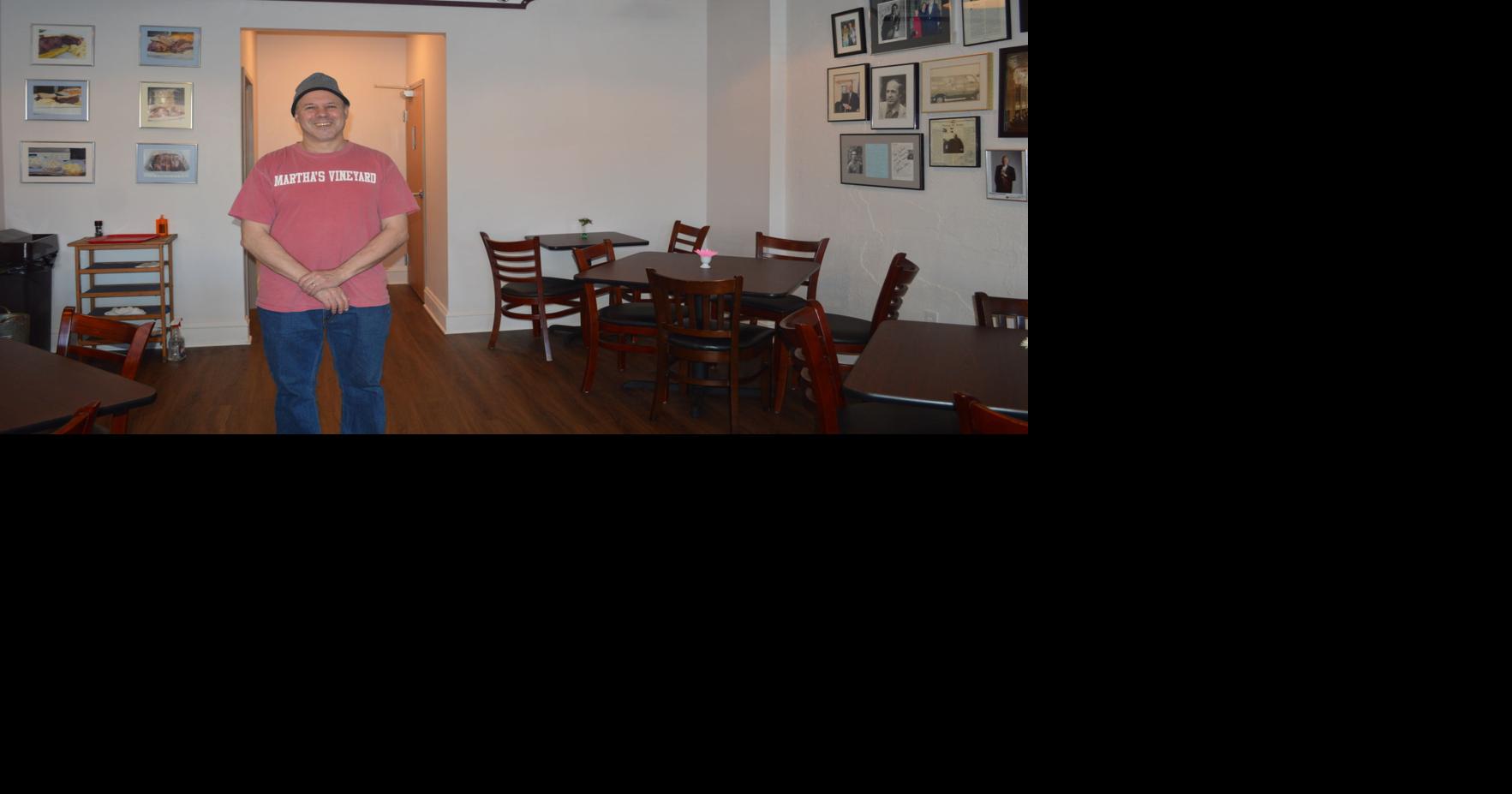 Mister Brisket invites people in to have a seat Next Door Nosh