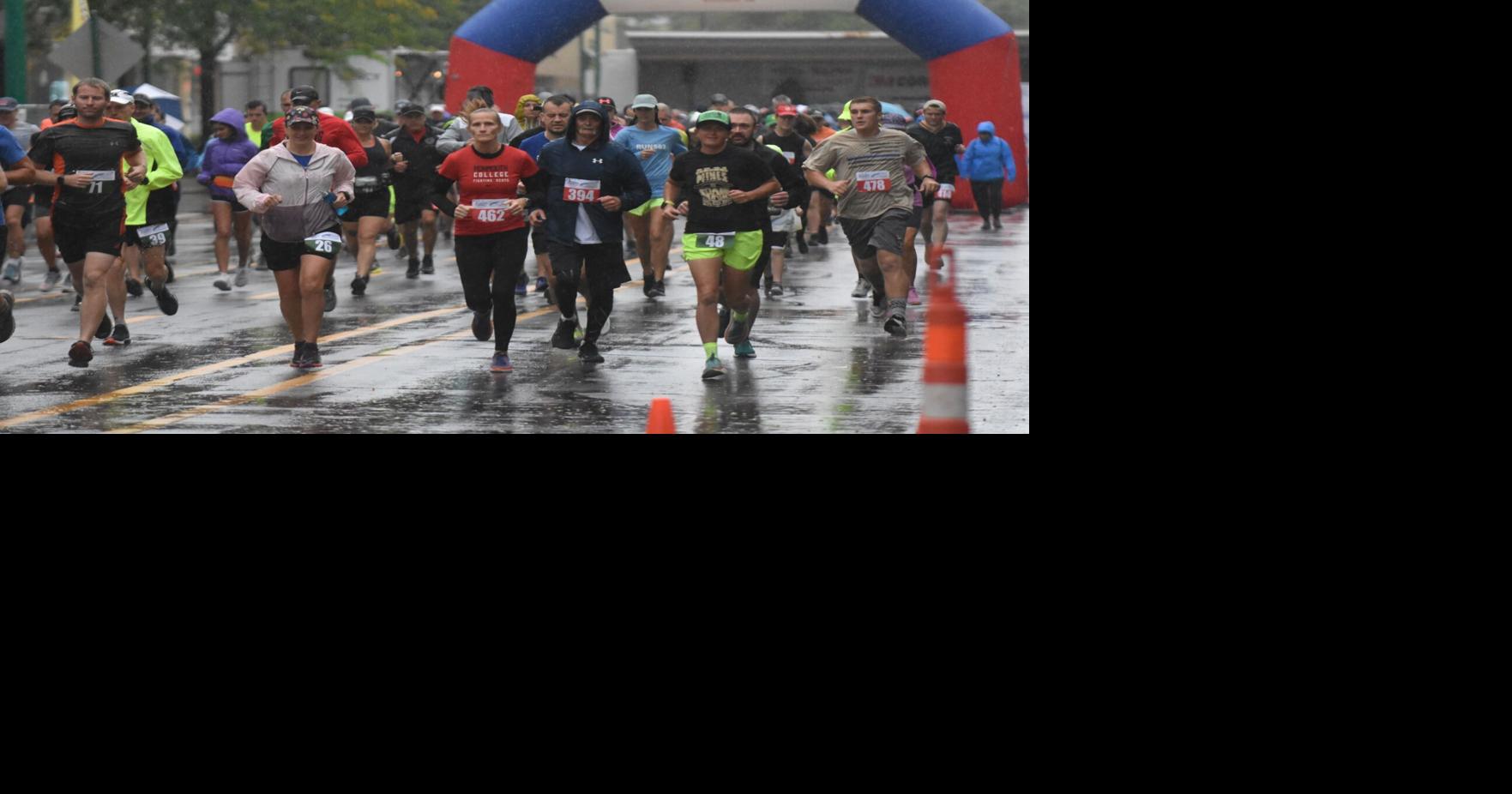CLINTON HALF MARATHON Runners push through rainy day Sports