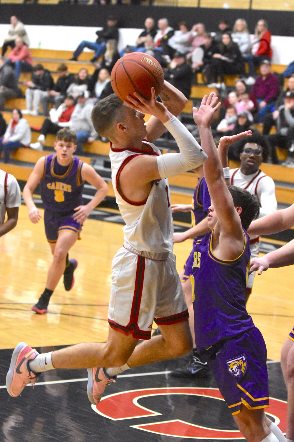 Central DeWitt Secures 70-64 Win over Clinton River Kings in Mississippi Athletic Conference Matchup