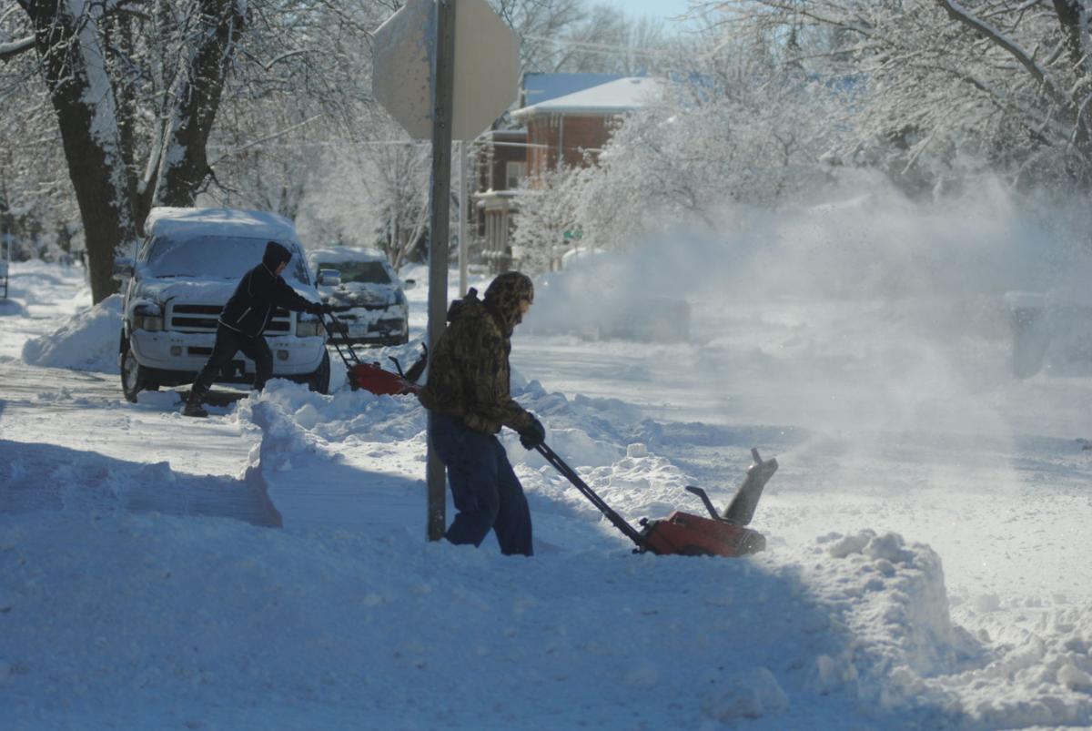 Clinton digs out from snow storm News