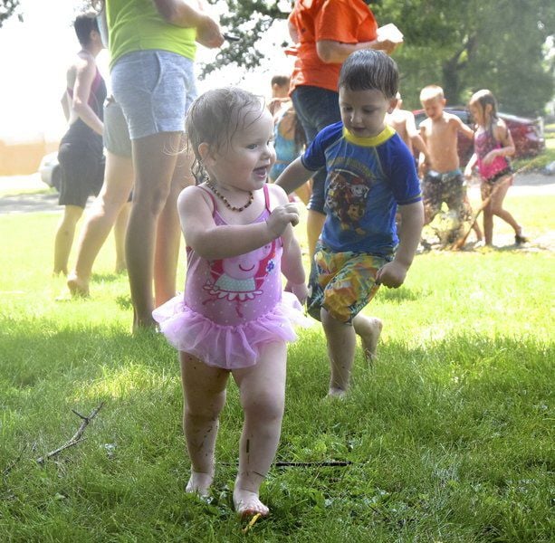 Children cool off courtesy of Camanche Fire Department Local News