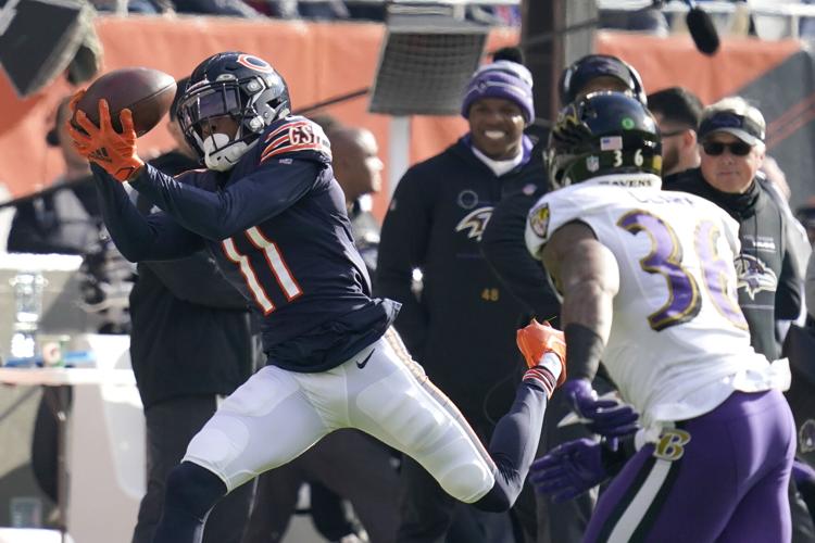 Darnell Mooney of the Chicago Bears reacts after catching a pass
