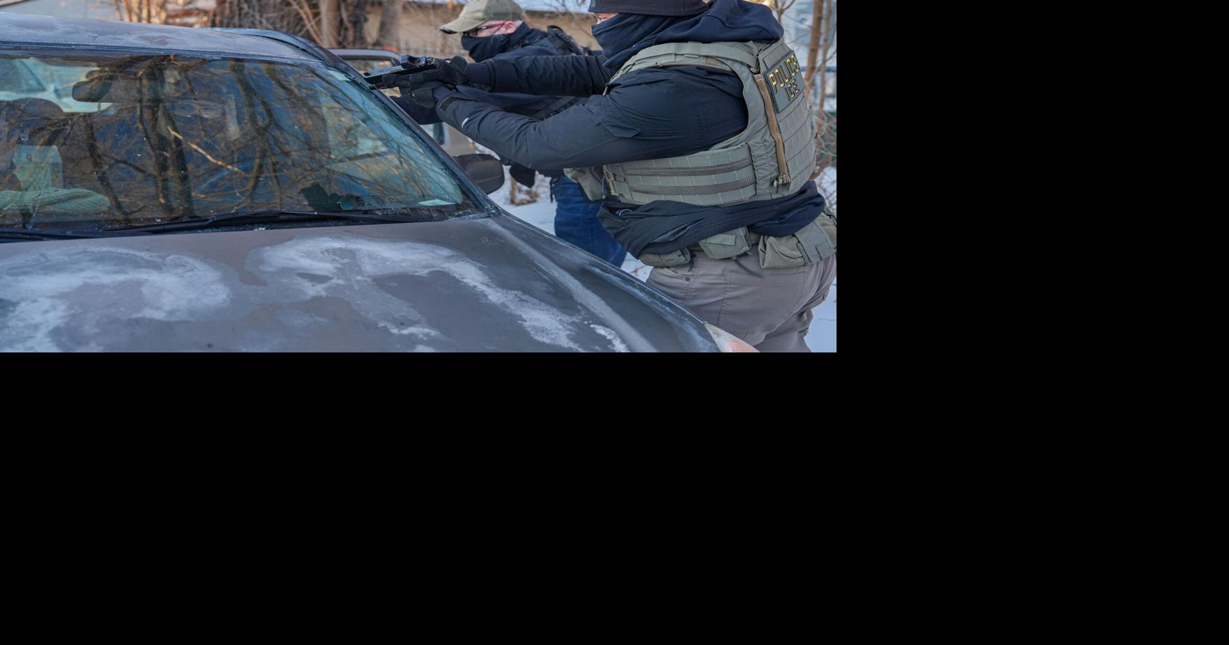 Immigration agents draw guns and arrest activists following them in Minneapolis